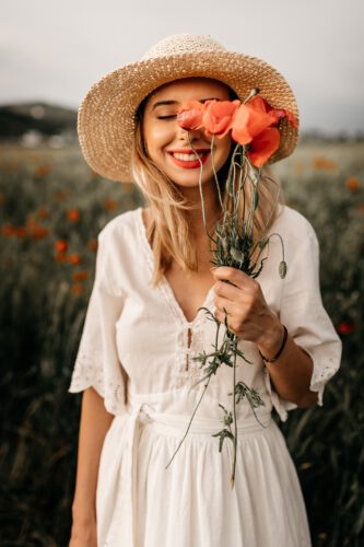 Photo by Monica Turlui: https://www.pexels.com/photo/charming-woman-in-hat-with-flowers-in-meadow-7137417/